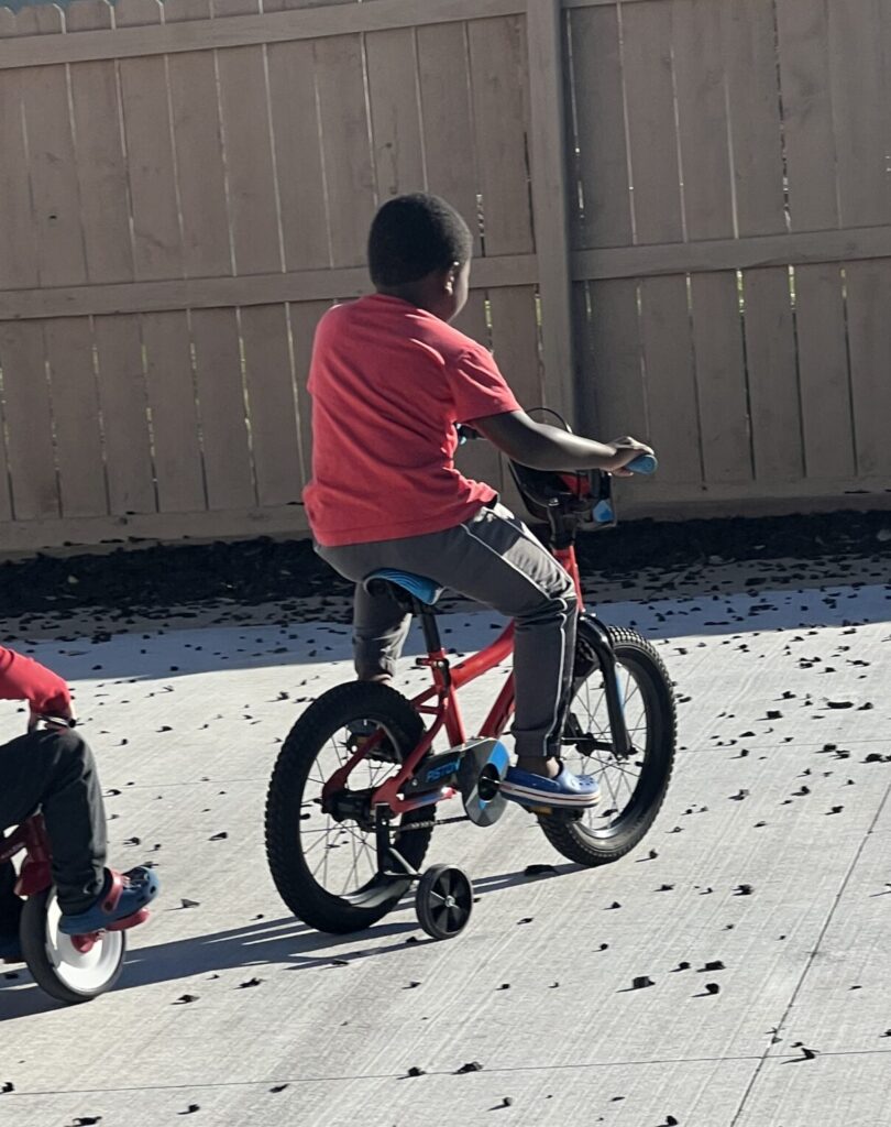 two children on bikes