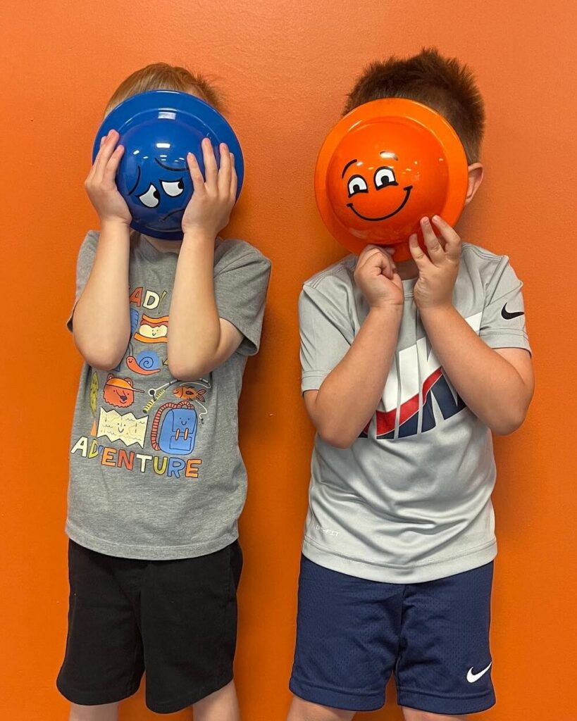 boys playing at the CWO office